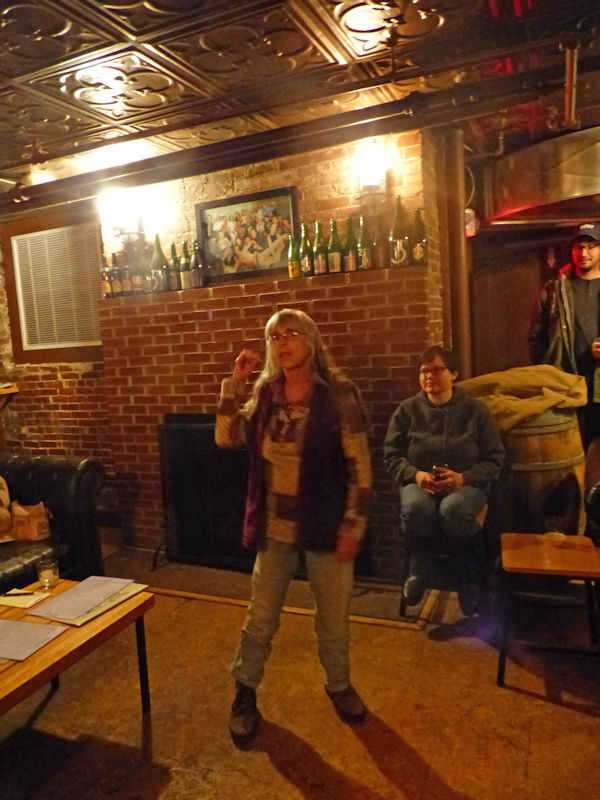 Judy leading a song, Portland Pub and Chantey Sing (pre-covid)