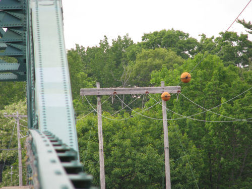 possible osprey nest on a transmission tower